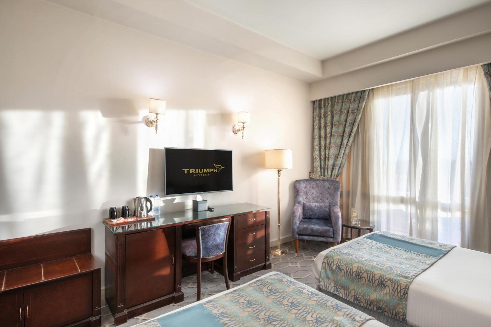 Triumph Plaza Hotel Caïro Kamer foto